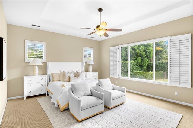 221 Grand Oaks Dr, Glendora, CA 91741 - bedroom with light carpet, baseboards, and ceiling fan