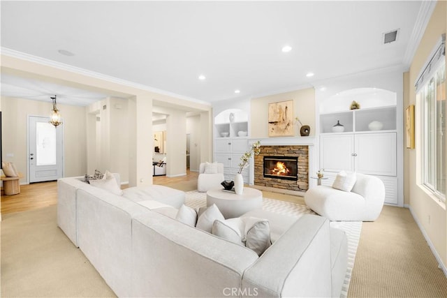 221 Grand Oaks Dr, Glendora, CA 91741 - living area featuring crown molding, light carpet, a stone fireplace, baseboards, and recessed lighting