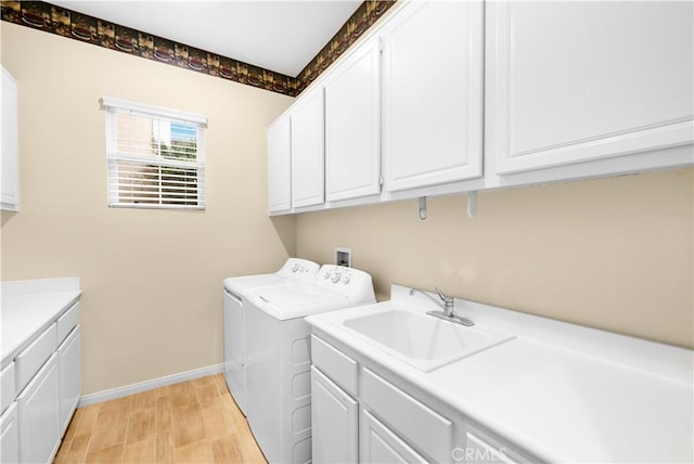 221 Grand Oaks Dr, Glendora, CA 91741 - laundry room featuring cabinet space, independent washer and dryer, and baseboards