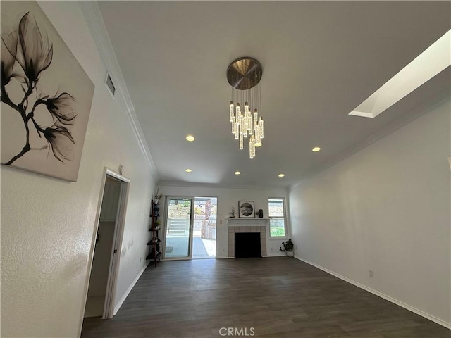 10328 Shoshone Ave, Riverside, CA 92503 - unfurnished living room with crown molding, dark wood-style flooring, baseboards, recessed lighting, and a fireplace