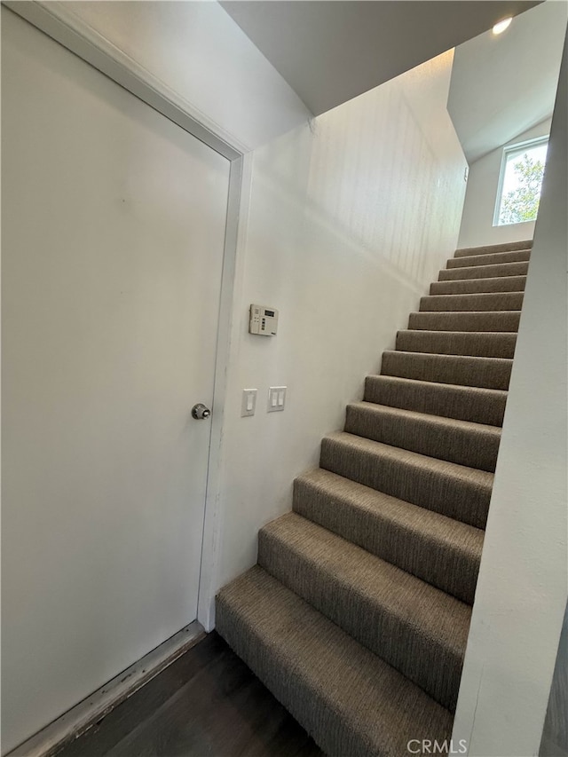 10328 Shoshone Ave, Riverside, CA 92503 - staircase with wood finished floors and lofted ceiling