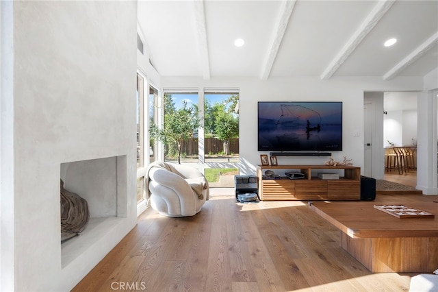3066 Claret Cir, Atwater, CA 95301 - living area with beamed ceiling, wood finished floors, and recessed lighting