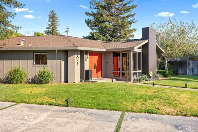 3066 Claret Cir, Atwater, CA 95301 - back of property with a chimney