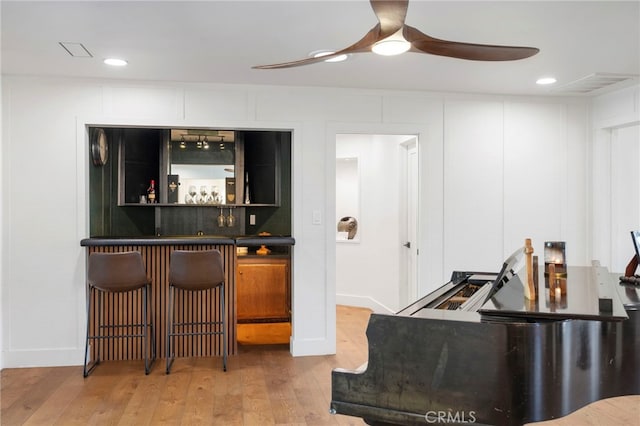 3066 Claret Cir, Atwater, CA 95301 - indoor dry bar featuring light wood-type flooring, a ceiling fan, and recessed lighting