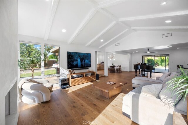 3066 Claret Cir, Atwater, CA 95301 - living area with wood finished floors, beamed ceiling, high vaulted ceiling, a ceiling fan, and recessed lighting