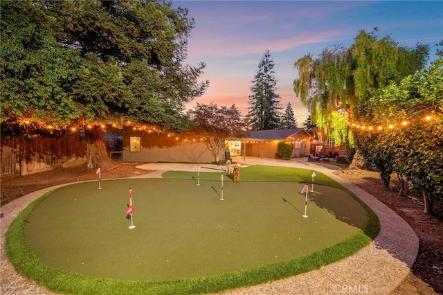 3066 Claret Cir, Atwater, CA 95301 - view of property's community with an area to practice putting, a patio, and driveway