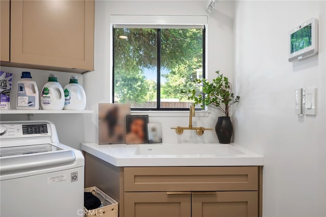 3066 Claret Cir, Atwater, CA 95301 - laundry room featuring washer / clothes dryer and cabinet space