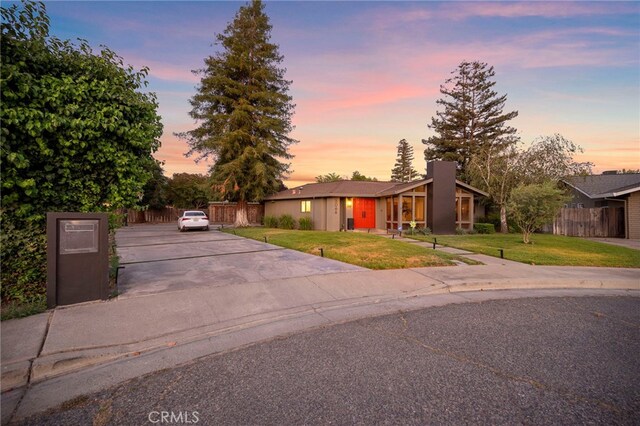 3066 Claret Cir, Atwater, CA 95301 - mid-century home featuring concrete driveway and a chimney