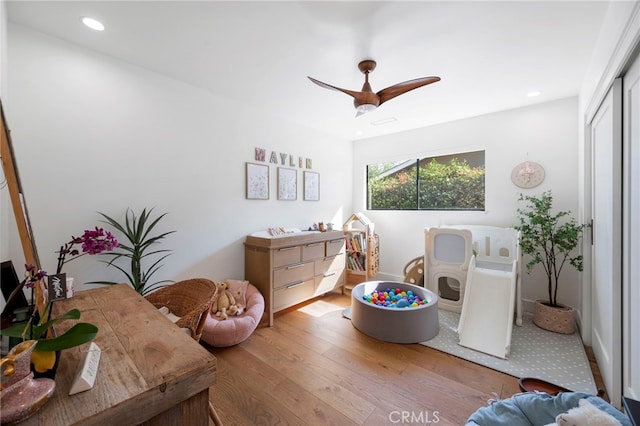 3066 Claret Cir, Atwater, CA 95301 - bedroom with wood finished floors, a closet, recessed lighting, and a ceiling fan