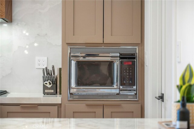3066 Claret Cir, Atwater, CA 95301 - kitchen view of stainless steel microwave and gray cabinetry