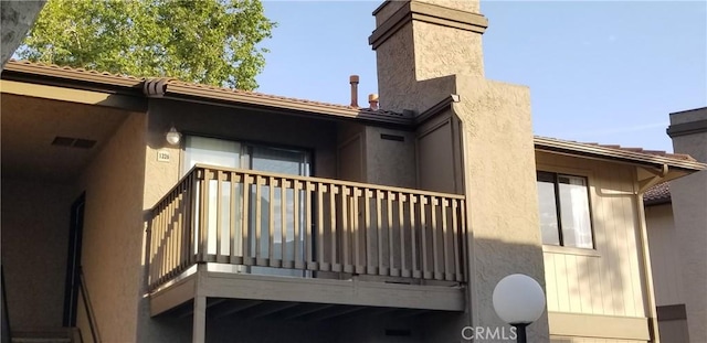 1265 Kendall Dr Unit 1326, San Bernardino, CA 92407 - back of house featuring a balcony