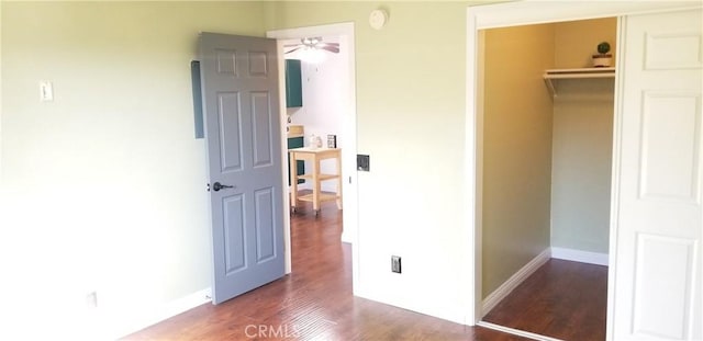 1265 Kendall Dr Unit 1326, San Bernardino, CA 92407 - unfurnished bedroom featuring wood finished floors, a closet, and baseboards