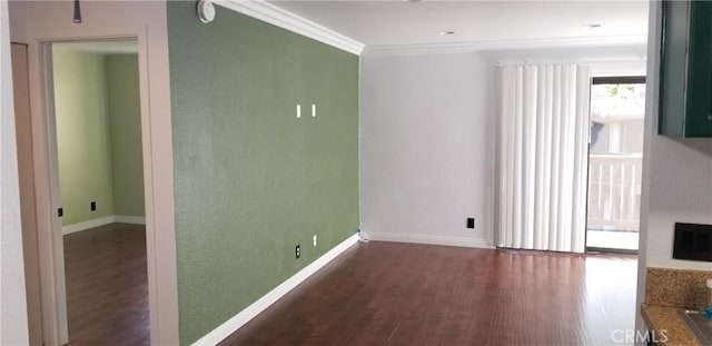 1265 Kendall Dr Unit 1326, San Bernardino, CA 92407 - spare room featuring wood finished floors, baseboards, and ornamental molding