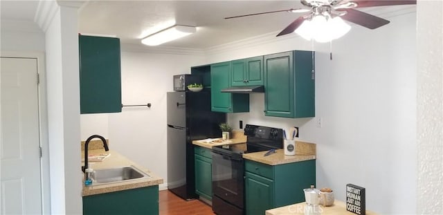 1265 Kendall Dr Unit 1326, San Bernardino, CA 92407 - kitchen with black range with electric cooktop, a sink, green cabinetry, under cabinet range hood, and light countertops