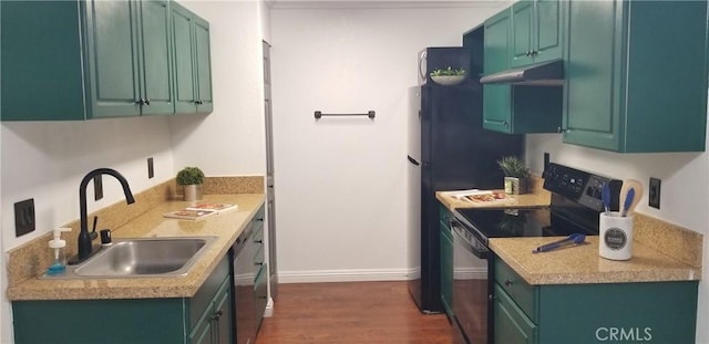 1265 Kendall Dr Unit 1326, San Bernardino, CA 92407 - kitchen featuring black electric range, a sink, dark wood finished floors, baseboards, and light countertops