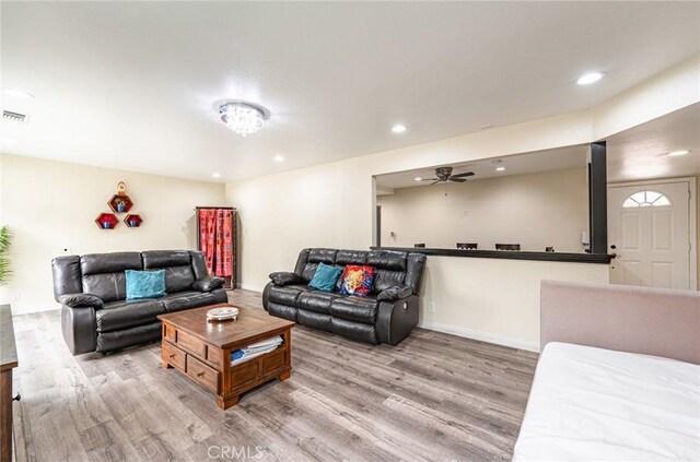9791 Lee St, Cypress, CA 90630 - living area featuring light wood-style flooring, recessed lighting, ceiling fan, and baseboards