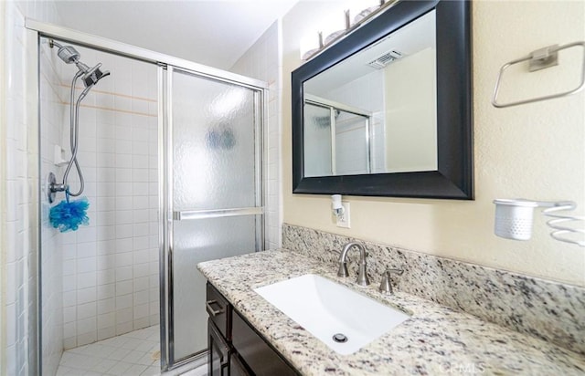 9791 Lee St, Cypress, CA 90630 - bathroom featuring a stall shower and vanity