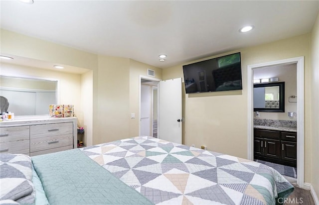 9791 Lee St, Cypress, CA 90630 - bedroom with recessed lighting, a sink, and connected bathroom