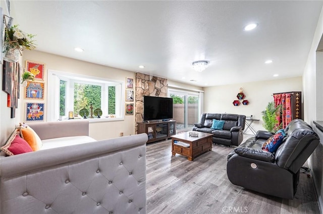 9791 Lee St, Cypress, CA 90630 - living area featuring light wood-style floors and recessed lighting