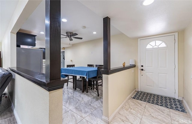 9791 Lee St, Cypress, CA 90630 - foyer entrance with baseboards, ceiling fan, recessed lighting, and marble look tile flooring