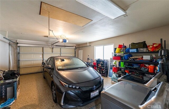 9791 Lee St, Cypress, CA 90630 - garage featuring a garage door opener