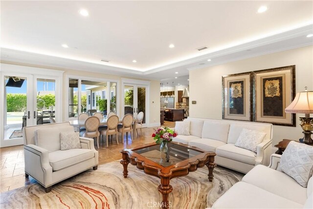 1921 Windward Ln, Newport Beach, CA 92660 - living room with healthy amount of natural light, ornamental molding, recessed lighting, and french doors