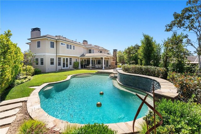 1921 Windward Ln, Newport Beach, CA 92660 - swimming pool featuring a patio area and a lawn
