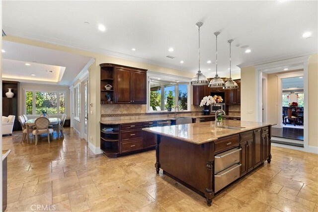 1921 Windward Ln, Newport Beach, CA 92660 - kitchen featuring open shelves, a sink, stone tile floors, healthy amount of natural light, and ornamental molding
