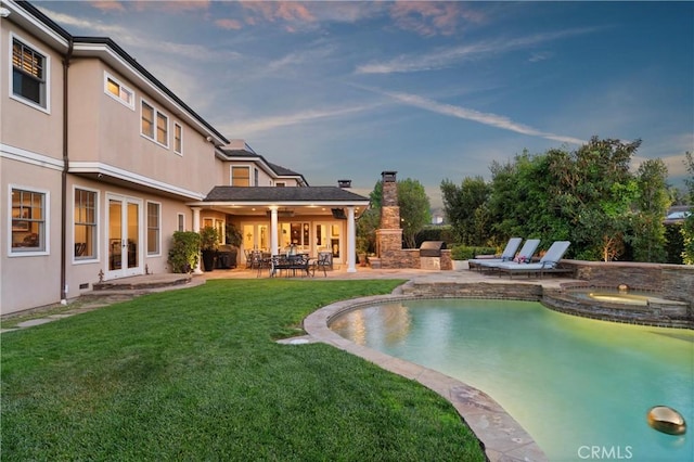 1921 Windward Ln, Newport Beach, CA 92660 - view of swimming pool featuring a patio, french doors, a yard, a pool with connected hot tub, and a ceiling fan