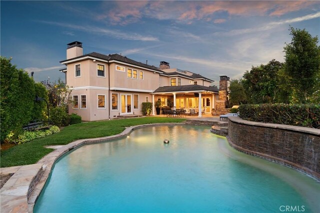1921 Windward Ln, Newport Beach, CA 92660 - outdoor pool with a lawn and a patio