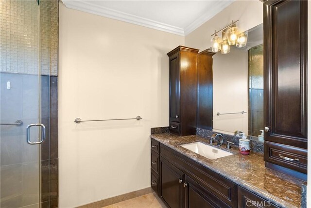 1921 Windward Ln, Newport Beach, CA 92660 - bathroom featuring vanity, crown molding, a shower stall, tile patterned floors, and baseboards
