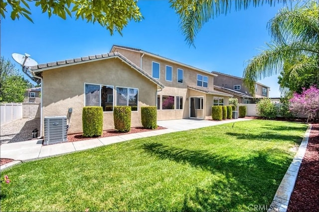 14939 Franklin Ln, Eastvale, CA 92880 - rear view of house with stucco siding and a patio area
