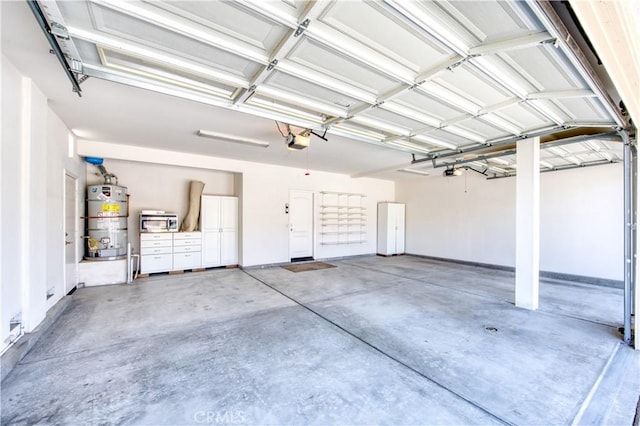14939 Franklin Ln, Eastvale, CA 92880 - garage featuring water heater and a garage door opener