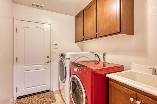 14939 Franklin Ln, Eastvale, CA 92880 - laundry area featuring washing machine and clothes dryer and cabinet space