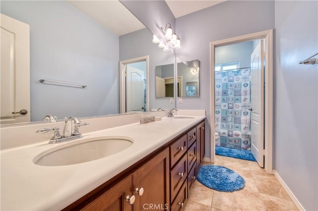 14939 Franklin Ln, Eastvale, CA 92880 - bathroom with double vanity, a shower with curtain, and tile patterned floors