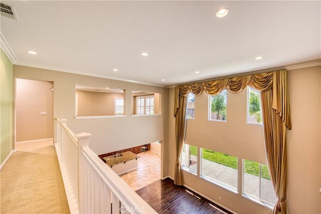 14939 Franklin Ln, Eastvale, CA 92880 - hallway featuring ornamental molding, recessed lighting, and an upstairs landing