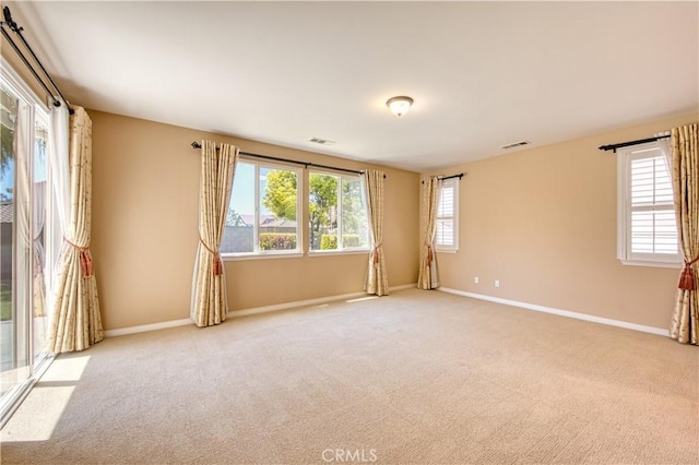 14939 Franklin Ln, Eastvale, CA 92880 - spare room featuring light carpet and baseboards