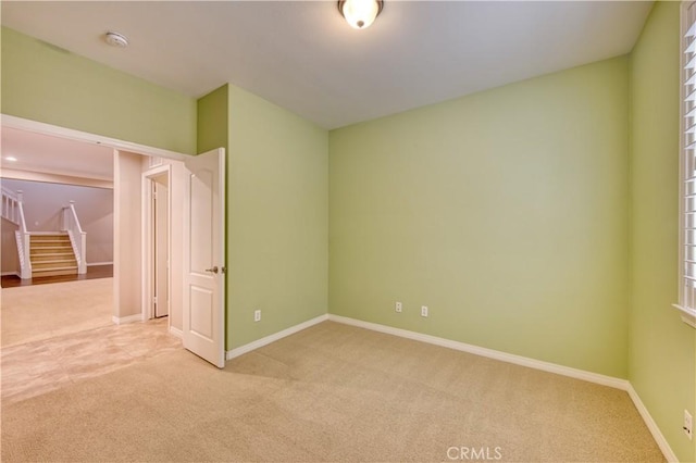 14939 Franklin Ln, Eastvale, CA 92880 - spare room with light colored carpet and a smoke detector
