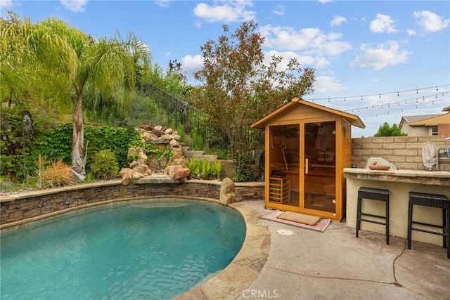 19969 Via Joyce Dr, Saugus, CA 91350 - view of swimming pool featuring a patio and an outbuilding