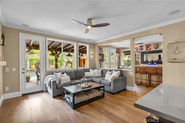 19969 Via Joyce Dr, Saugus, CA 91350 - living area with ceiling fan, light wood-style flooring, crown molding, and baseboards