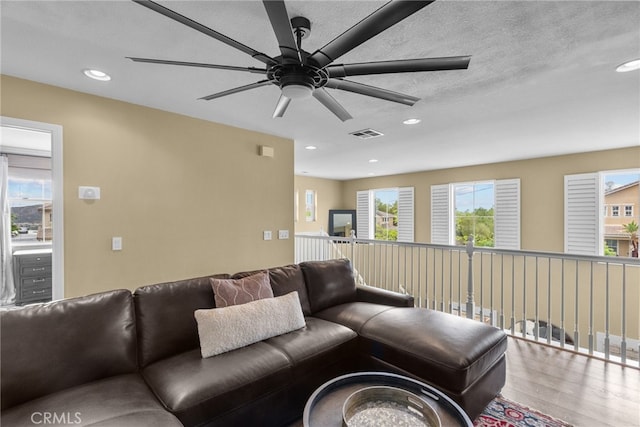 19969 Via Joyce Dr, Saugus, CA 91350 - living area with ceiling fan, recessed lighting, and wood finished floors