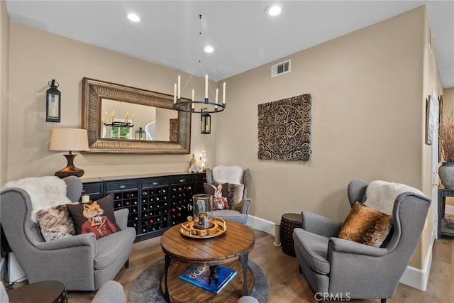 19969 Via Joyce Dr, Saugus, CA 91350 - living area with wood finished floors, a chandelier, baseboards, and recessed lighting