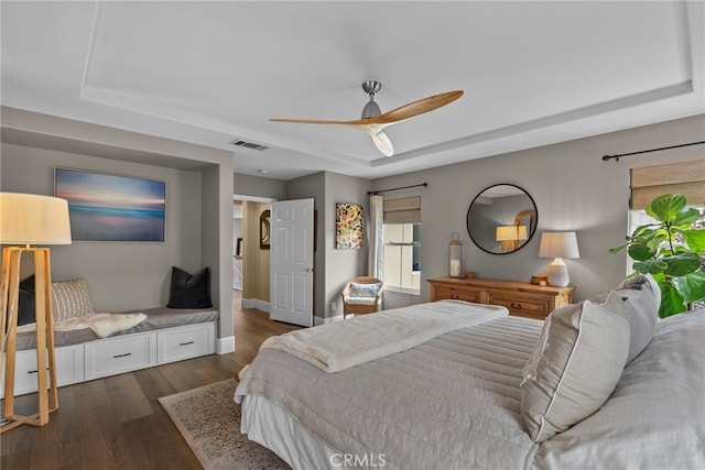 19969 Via Joyce Dr, Saugus, CA 91350 - bedroom with a tray ceiling, dark wood-style floors, baseboards, and ceiling fan