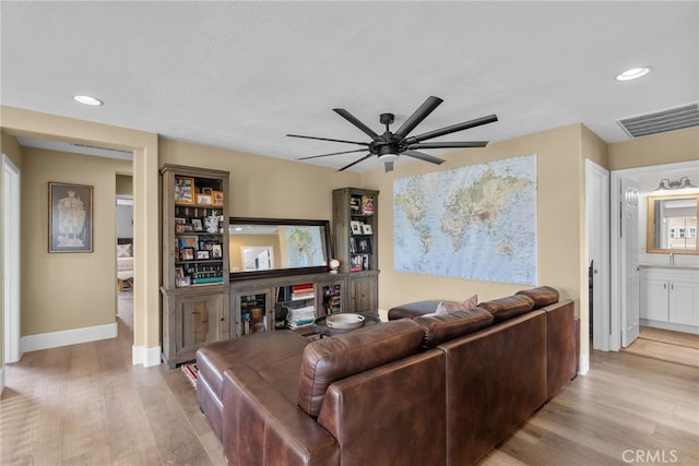 19969 Via Joyce Dr, Saugus, CA 91350 - living area with wood finished floors, recessed lighting, ceiling fan, and baseboards
