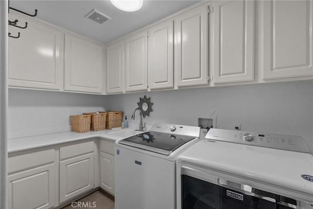 19969 Via Joyce Dr, Saugus, CA 91350 - washroom featuring cabinet space and washer and dryer