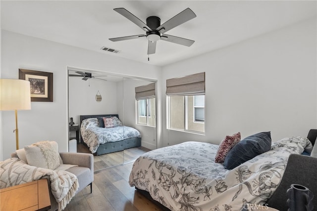 19969 Via Joyce Dr, Saugus, CA 91350 - bedroom with a closet, wood-type flooring, a ceiling fan, and baseboards