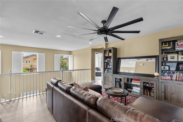 19969 Via Joyce Dr, Saugus, CA 91350 - living room with wood finished floors, a ceiling fan, and recessed lighting