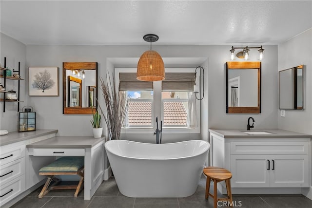 19969 Via Joyce Dr, Saugus, CA 91350 - full bath featuring vanity, a freestanding bath, tile patterned flooring, and a textured ceiling