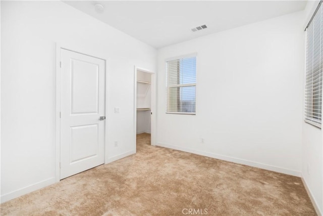501 Embrook Way, West Covina, CA 91791 - unfurnished bedroom featuring carpet floors, baseboards, a spacious closet, and a closet