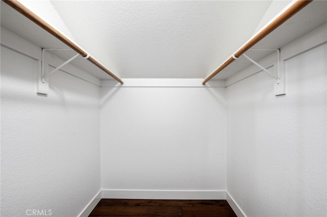 23906 Olson Ln, Lomita, CA 90717 - spacious closet with dark wood-style flooring